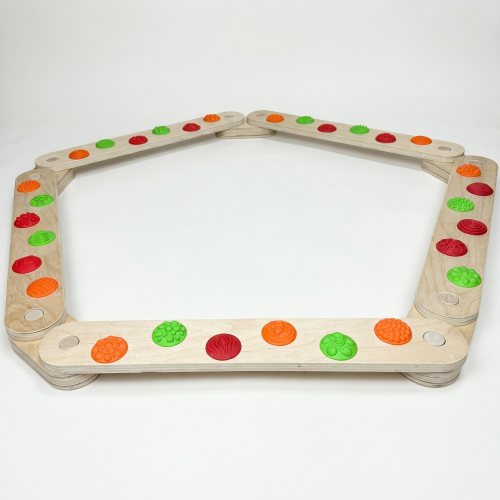 Balance track with massage elements and balance board