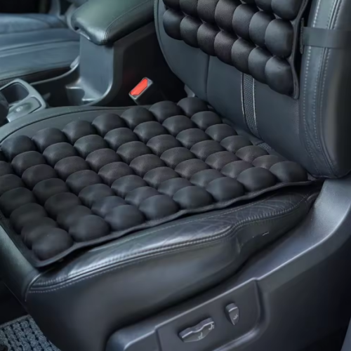 Inflatable massage cushion for sitting with a pump